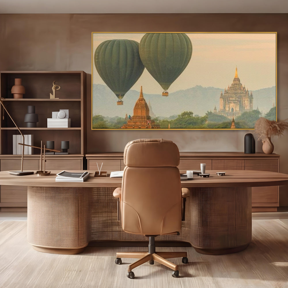 Tablou canvas cu tablou canvas cu peisaj din bagan, in rama de aluminiu auriu, pe perete intr-un birou